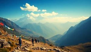 Stunning view of the Manaslu trek trail with trekkers and Mount Manaslu peaks in the background.